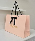 Luxury Paper Bag with hotstamped logo and ribbon bow